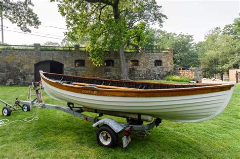 White Maine Coast Peapod Sold Worldwide Classic Boat Show