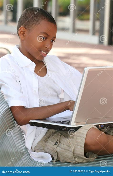 African American Teenager Boy On Laptop Computer Stock Image Image Of