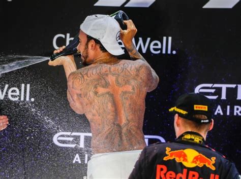 Another blast through the time zones for lewis hamilton this week, just the seven hours to singapore. Lewis Hamilton Hand Tattoo 2019