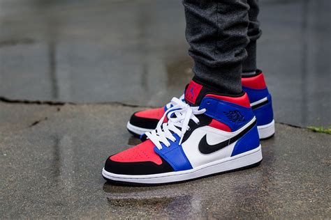 The model was designed in 1984, released in '85, and — due to michael jordan's foot injury in '86 — it ran through '87. Air Jordan 1 Mid Top 3 On Feet Sneaker Review