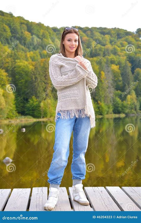 Beautiful Young Woman Relaxing Near A Lake Stock Image Image Of Color