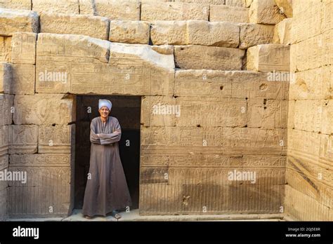 upper egypt west bank of the nile temple of edfu egyptian man in traditional clothing robe