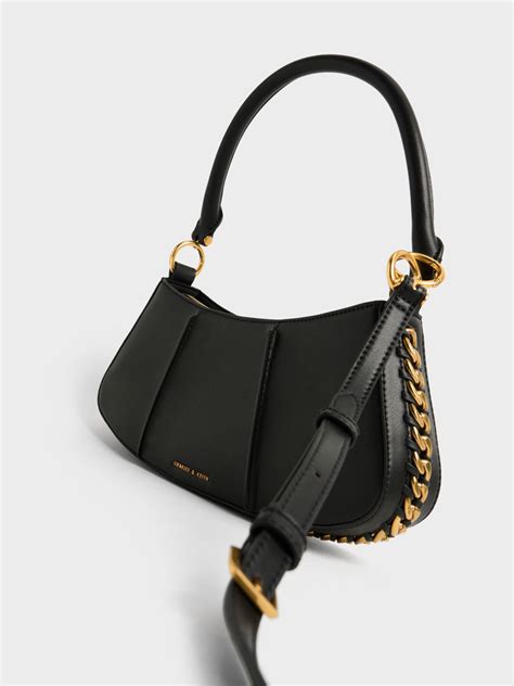 Black Arlys Curved Shoulder Bag Charles And Keith Au Charles And Keith