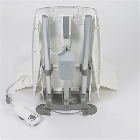 Side flaps are hinged securely to the seat to allow safe movement and transfers. Mangar Archimedes Bath Lift Chair : Powered Bathtub Lift