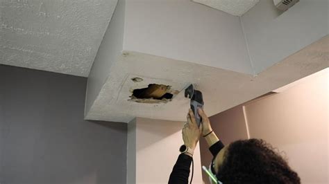 Just use a hole saw to cut a circular patch the same size as the. How to Repair a Large Drywall Hole in Your Ceiling ...