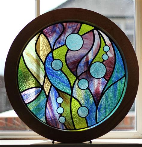 stained glass window abstract window artwork entitled caladan flow by artist mungo perk
