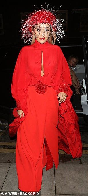 Rita Ora Suffers A Wardrobe Mishap As She Flashes Her Spanx In A Billowing