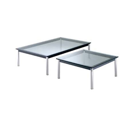 The 15mm thick clear glass top rests on a black enameled steel frame and tubular steel frame legs. LC10-P by Cassina | Outdoor | Product