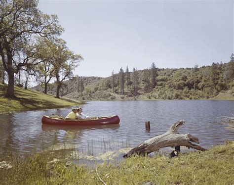 Couple Fishing From Canoe In Lake Free Photo Download Freeimages