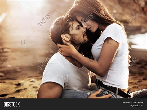 handsome man hugging image and photo free trial bigstock