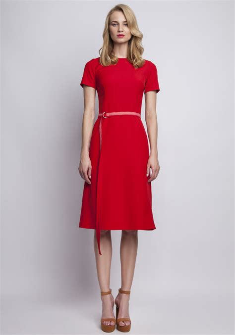 Red elegant dress with ornate waist belt