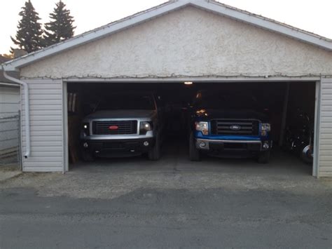 What are the typical dimensions of an one car garage? Can you fit your big Ford and another car comfortably into ...