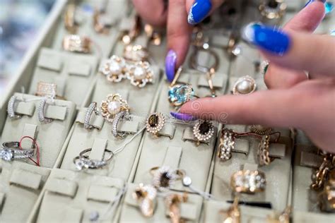Female Hands Showing Golden Jewellery In Shop Stock Photo Image Of