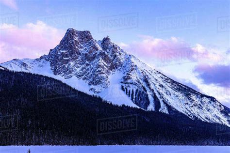 Snow Covered Mountain During Sunset In The Snowy Canadian Rockies