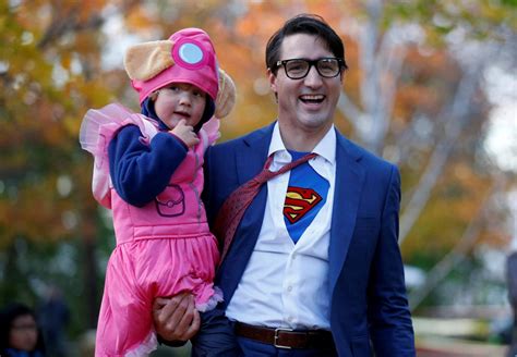 Canadian Prime Minister Justin Trudeau Dons Clark Kent Costume For Halloween London Evening