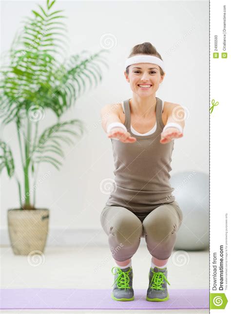 Smiling Woman In Sports Wear Squatting Stock Image Image Of Squat