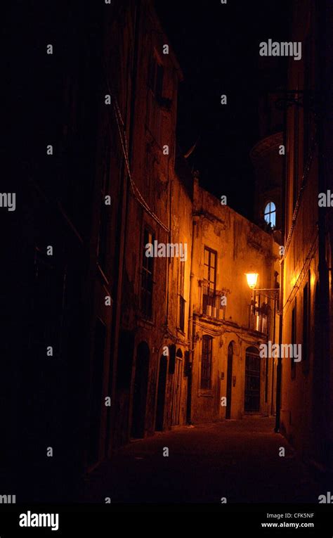 Narrow Street At Night Siracusa Italy Stock Photo Alamy