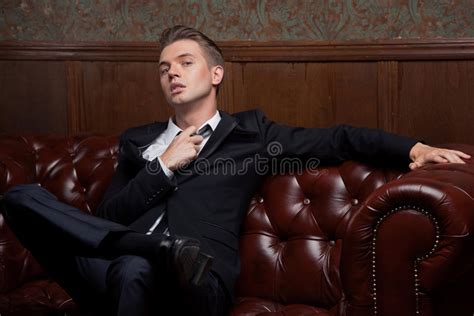 4859 Man Suit Sitting Sofa Stock Photos Free And Royalty Free Stock