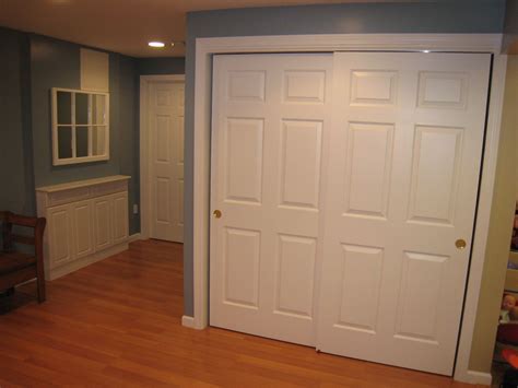 White sliding doors for minimalist closet idea. Types Of Sliding Closet Doors | Wooden doors interior ...