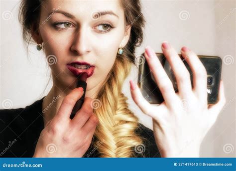 Girl Painting Her Lips And Looking Into The Mirror Stock Image Image Of Long Fashionable