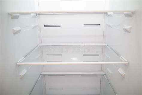 Close Up Of Empty Refrigerator Inside Empty Fridge Shelves Stock Image