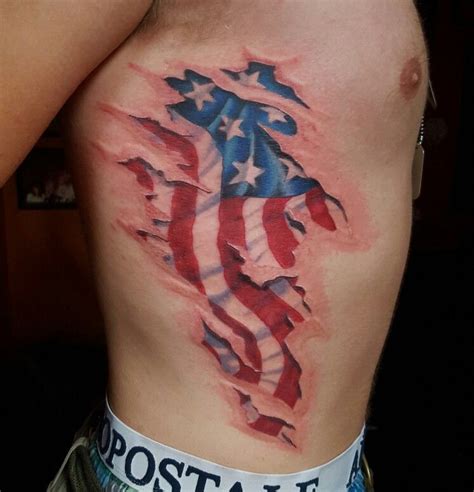 33 American Flag Ripped Skin Tattoo Robbiejohno