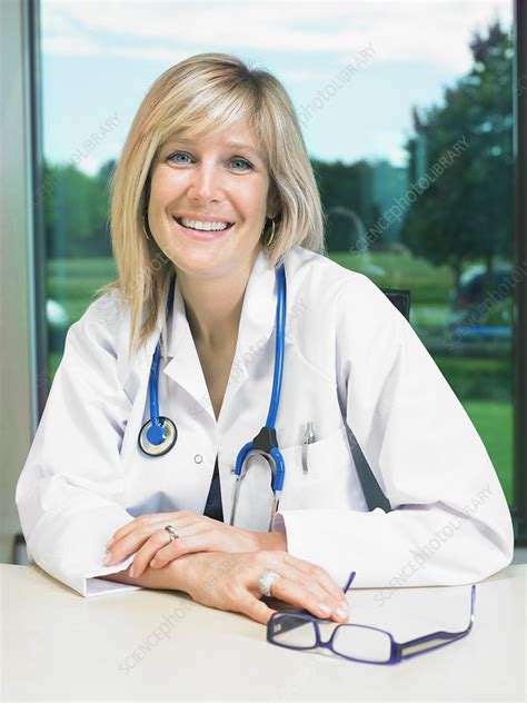 Portrait Of Smiling Female Doctor At Her Stock Image F0032645 Science Photo Library