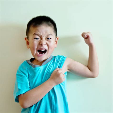 Small Kid Flexing Some Muscle Stock Photos Pictures