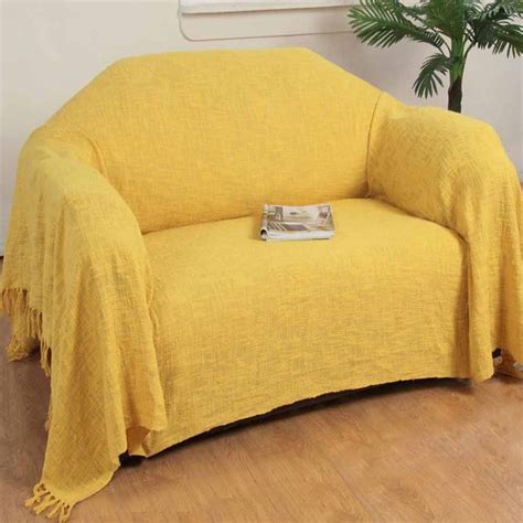 They are either made of separate pieces of flexible fabric that completely encase the base of the couch and cushions, or they comprise thick pads of material that simply drape over the seat and stay securely in place with included straps. Ochre Yellow Cotton Nirvana Extra Large Throws for Sofas ...