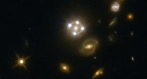 Ghostly “einstein Crosses” Spotted In Deep Space Could Help Resolve
