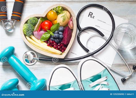 Healthy Lifestyle Concept With Diet Fitness And Medicine Stock Photo