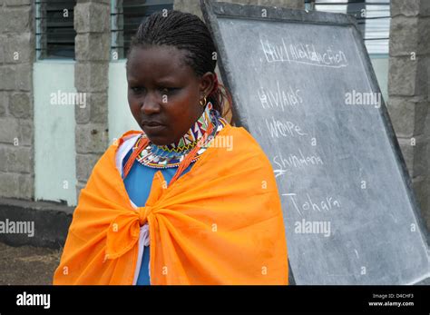 A Masai Woman Pictured During Education On Aids And Female Genital