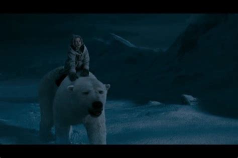 A Woman Riding On The Back Of A Polar Bear