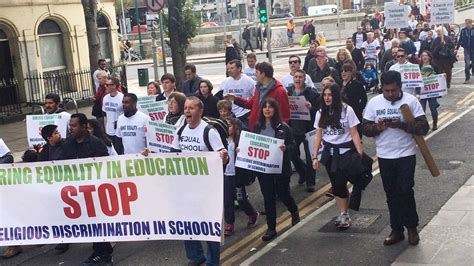 hundreds protest over ‘religious discrimination in schools the irish times