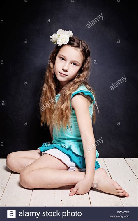Use them in commercial designs under lifetime, perpetual & worldwide rights. Cute Child Girl. Portrait of Young Teen on Dark Background ...
