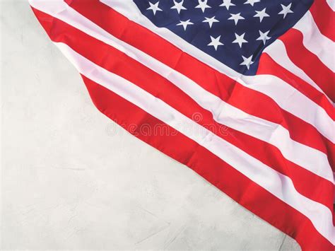 American Stars And Stripes Flag On Gray Concrete Background Stock Image