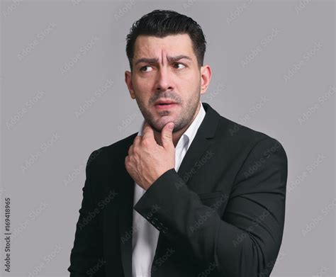Confused Businessman Thinking About Problem Stock Photo Adobe Stock