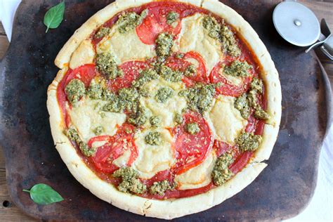Margherita Pizza With Fresh Basil Pesto And Vegan Mozzarella Peppers