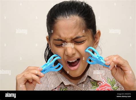 mumbai maharashtra india asia aug 13 2021 portrait of indian eight years old girl with blue