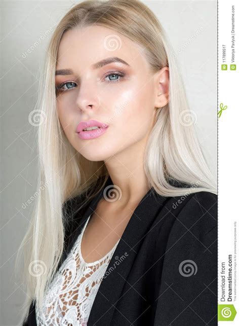 Pretty Young Blonde Girl With Pink Lips And Long Straight
