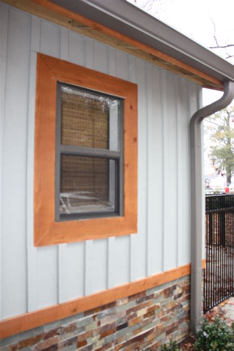 Board and batten is also versatile, able to be installed vertically, horizontally, or both. Modern Craftsman exterior with board and batten siding ...