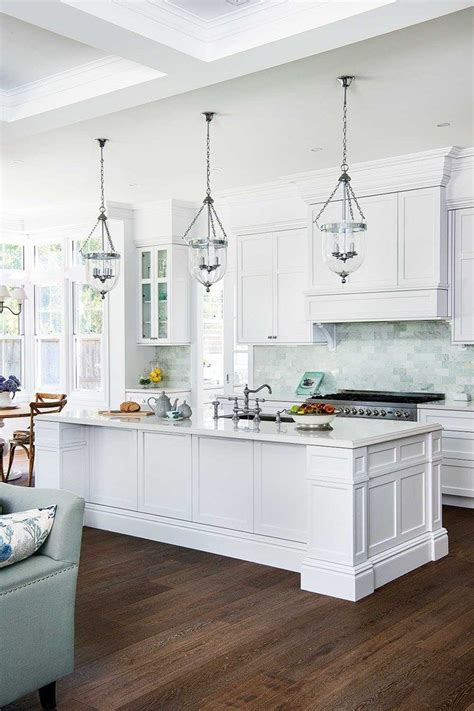 26 beautiful and beachy shingle style homes architectural digest. A home tour that shows how to decorate in Hamptons style ...