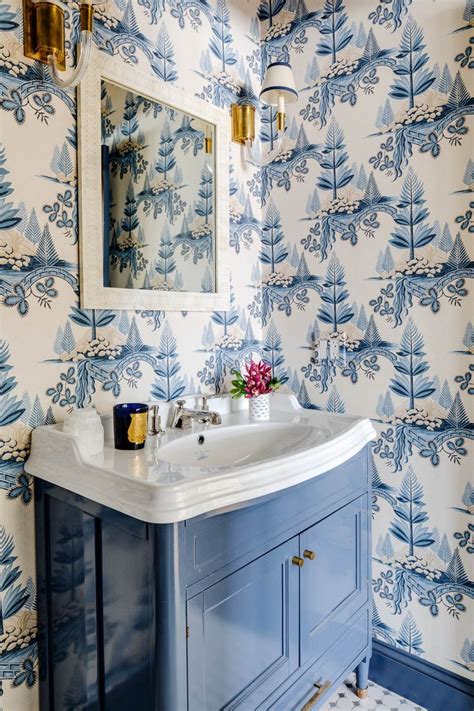 We cannot get enough of this wallpaper in the powder bathroom! The blue
