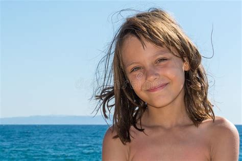 a beautiful girl posing on a beach by the sea stock image image of happiness beautiful 127251669