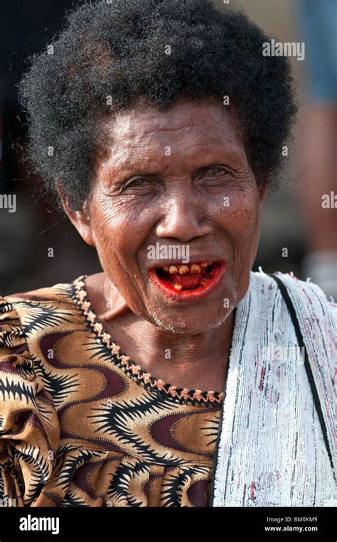 An Old Lady Roadside Vendor Her Teeth Stained Red From The Tradition Of Chewing Areca Betel