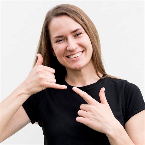 Deaf Woman Communicating Through Sign Language Free Photo