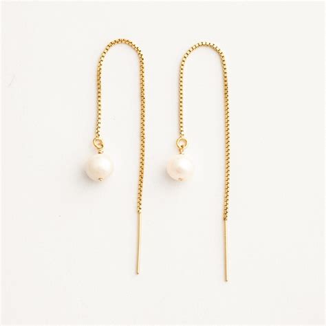 A Trendy Take On The Classic Pearl Earrings These Threaders Are The