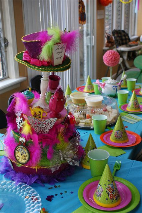 As part of the decorations, elena created these beautiful, magical floating teacups. Paper Chick: Alice in Wonderland Birthday Party Centerpiece