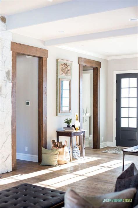 Totally Stunning Entryway With Raw Wooden Trim Black French Door And