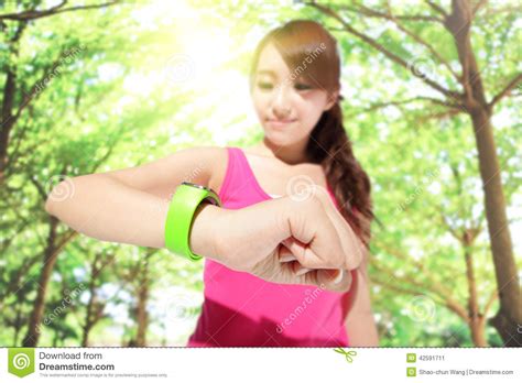 To find out what x squar. Health Sport Woman Wearing Smart Watch Stock Photo - Image ...